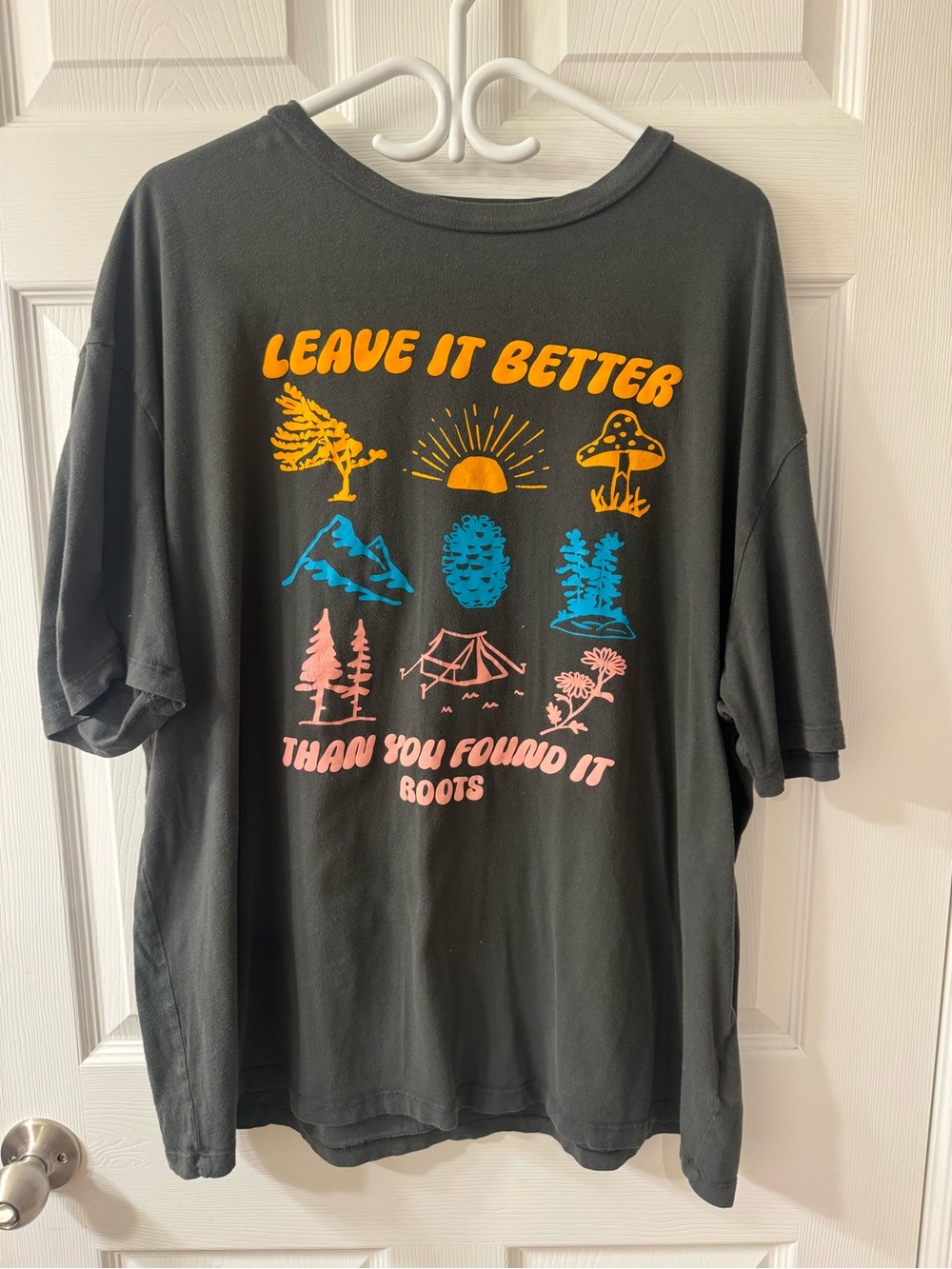 Roots Black Short Sleeve Tee with Yellow, Blue and Pink Outdoor Graphics